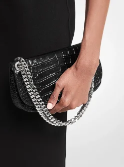 Bolsa envelope em pele com motivo de crocodilo em relevo Christie | Michael Kors [PT]