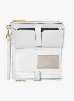 Carteira de mão com logótipo Empire em jacquard Jet Set grande | Michael Kors [PT]
