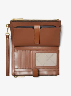 Carteira para smartphone com logótipo exclusivo às riscas Jet Set grande | Michael Kors [PT]