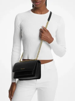 Mala de ombro em pele granulada convertível Claire grande | Michael Kors [PT]