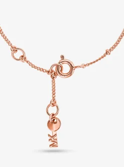 Pulseira em forma de coração com incrustações em prata de lei banhada a metal precioso | Michael Kors [PT]