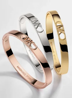 Pulseira rígida com logótipo Empire em latão banhada a metal precioso | Michael Kors [PT]